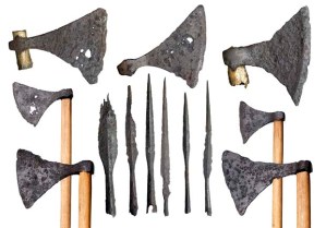Viking weapons from the Thames. Selection of iron axes and spearheads. The wooden handles are modern additions. In the late 900s and early 1000s Scandinavian rulers like Swein Forkbeard of Denmark and Olaf Tryggvason of Norway tried to gain control of the Danelaw and of the rest of England, and eventually Swein's son Cnut won the English throne. There were a number of battles along the Thames and around London Bridge. On one occasion the bridge was pulled down. These battle axes and spears were found during building works at the north end of London Bridge in the 1920s. They may have been lost in battle or thrown into the river by the victors in celebration.
