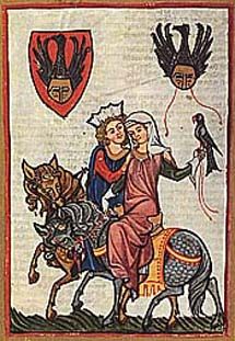 couple-on-horses-with-falcon